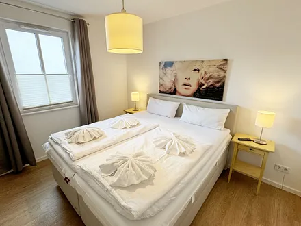 Doppelbett im Schlafzimmer