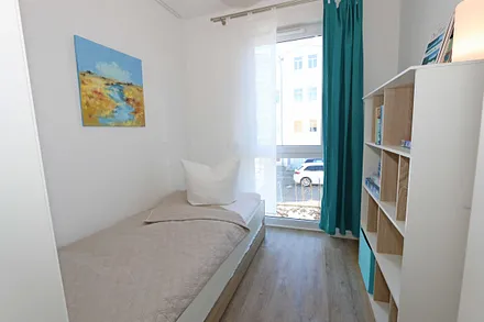 Schlafzimmer mit Einzelbett (0,90 m x 2,00 m)