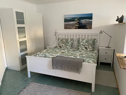 Schlafbereich mit Doppelbett