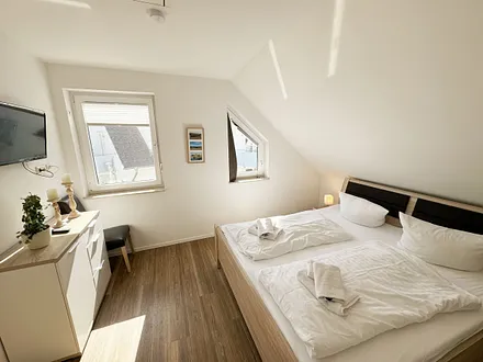 1. Schlafzimmer mit Doppelbett
