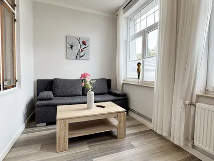 Veranda mit Couch zum Wohlfühlen