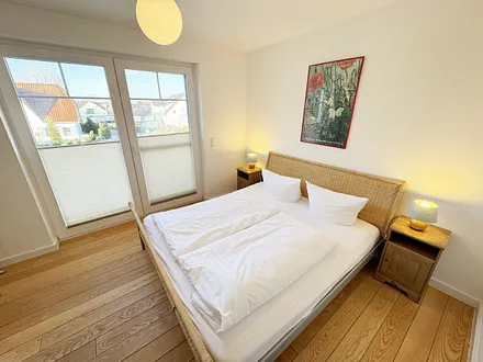 Schlafzimmer mit Doppelbett