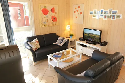 Ferienhaus Sandkörnchen - Couch- und TV-Bereich