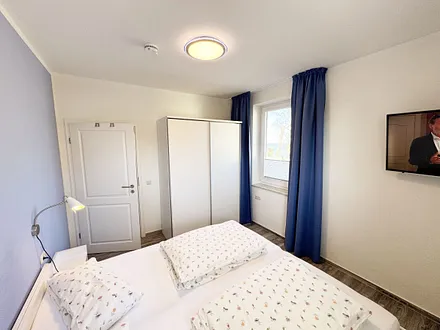 Schlafzimmer mit Doppelbett