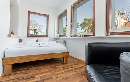 Veranda mit Doppelbett