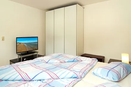 Schlafzimmer mit Doppelbett