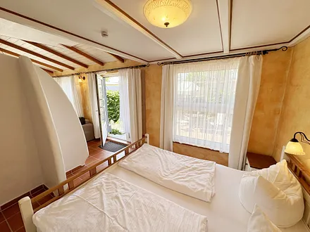 Ferienhaus Thea - offenes Schlafzimmer