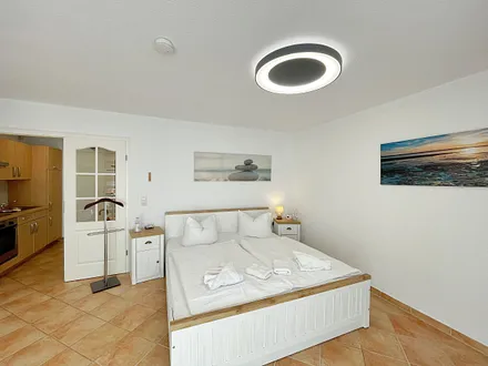 Schlafbereich mit Doppelbett