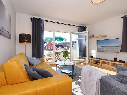 Wohnraum mit grossem TV