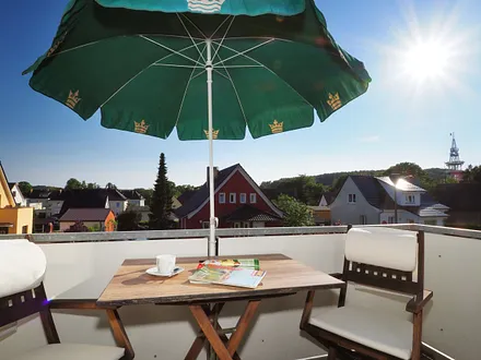 Südbalkon mit Sonnenschirm