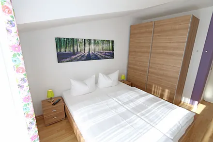 Schlafzimmer mit Doppelbett