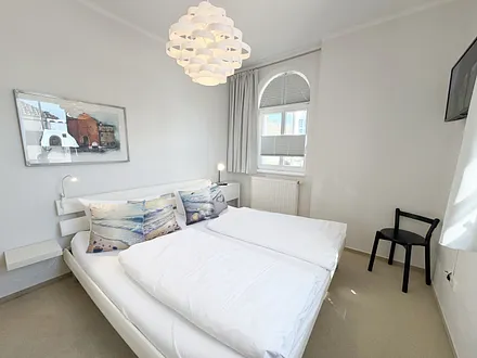 Schlafzimmer mit Doppelbett