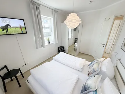 Schlafzimmer mit Doppelbett
