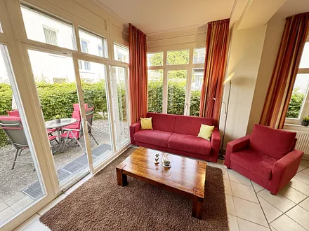 Couchecke mit Zugang zur Terrasse