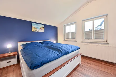 Schlafzimmer mit Doppelbett