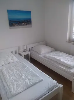Schlafzimmer mit 2 Einzelbetten 