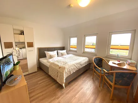 Wohn-, Schlaf- und Essbereich