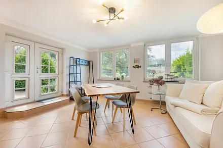 Die Veranda mit Garderobe ...