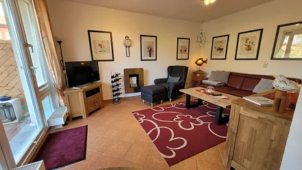 Genießen Sie vom Wohnzimmer aus einen traumhaften Ausblick. Wohnzimmer Bild I