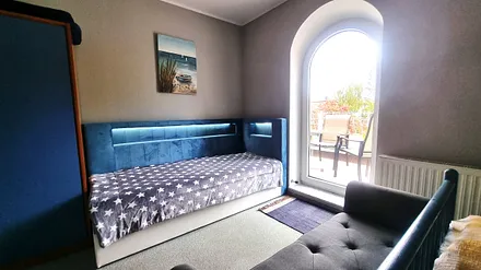 Zugang zum Balkon vom Schlafzimmer und vom Wohnzimmer