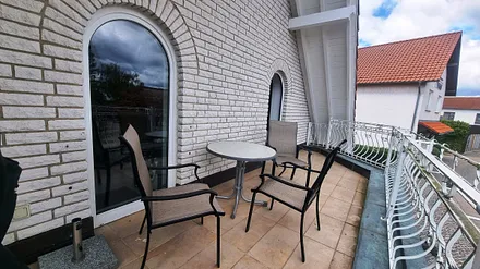 Zugang zum Balkon vom Wohnzimmer und Schlafzimmer