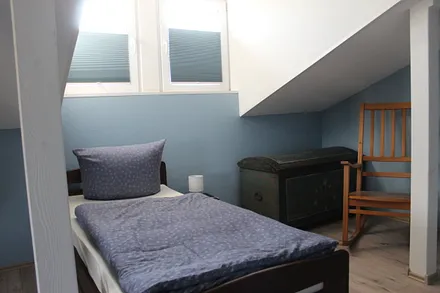 Schlafzimmer oben mit 3 Betten