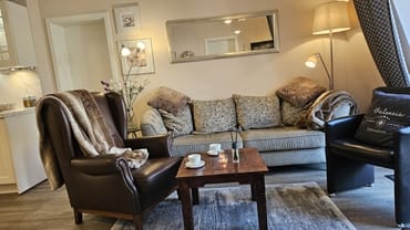 Lederohrensessel lädt zum Verweilen ein