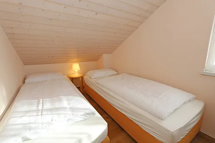 4. Schlafzimmer mit Einzelbetten
