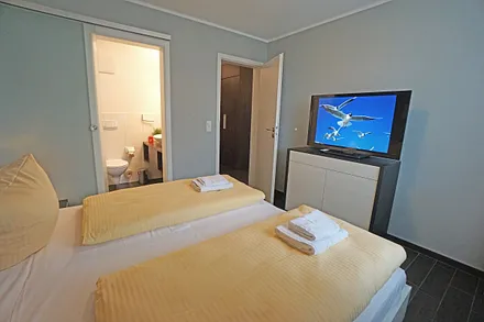 zweites Schlafzimmer mit Doppelbett