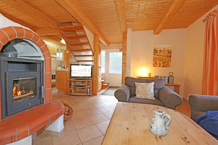 Sitzecke mit Kamin und TV