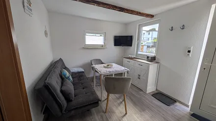Wohnzimmer mit Fernseher