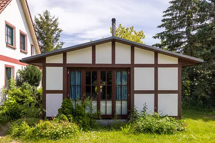 Die Außenansicht vom Ferienhaus Gans Gemütlich.