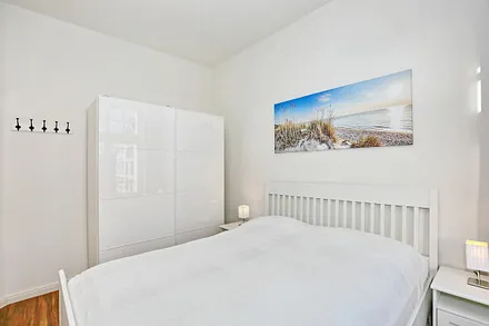 Schlafzimmer mit Balkonzugang