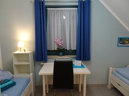 Das kleine Schlafzimmer im OG