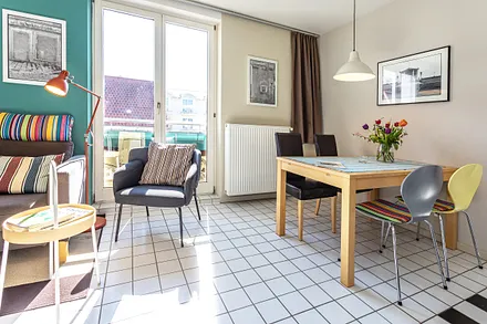 Das bodentiefe Fenster ist als französcher Balkon konzipiert.