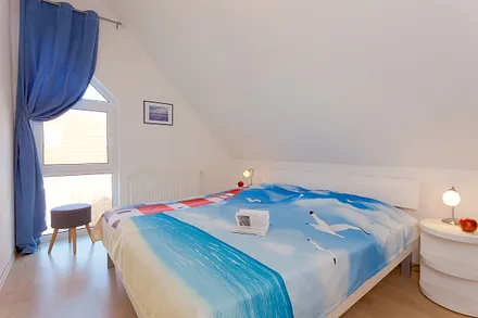 Schlafzimmer mit Doppelbett