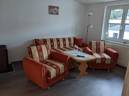 Sitzbereich mit Ausziehbarer Couch
