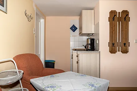  Blick von Sitzbereich zur Küche