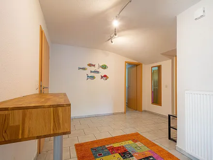 Der große Flur mit Zugang zu den Schlafzimmern