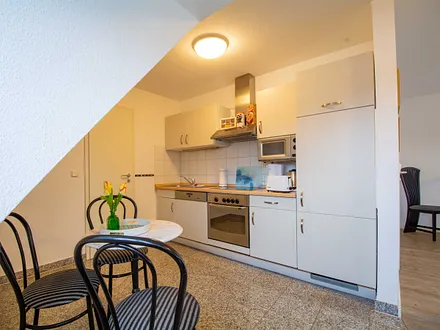 Die voll ausgestattete Küchenzeile in der unteren Etage