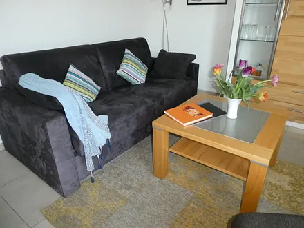 Wohnbereich mit Ausklappcouch