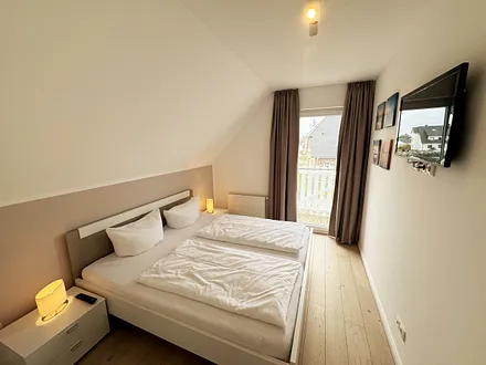 Ferienhaus Ilsebill - 2. Schlafzimmer mit Zugang zum Balkon