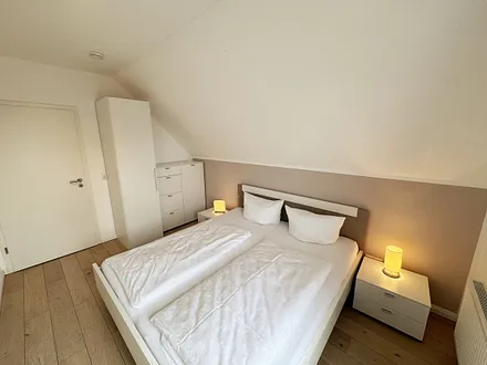 Ferienhaus Ilsebill - 2. Schlafzimmer mit Kleiderschrank