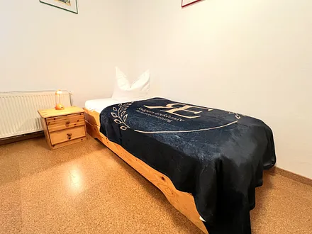 Schlafzimmer mit Einzelbett