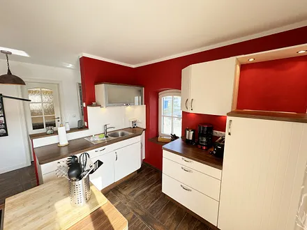 modern und komfortabel ausgestattete Küche lädt zum Kochen ein