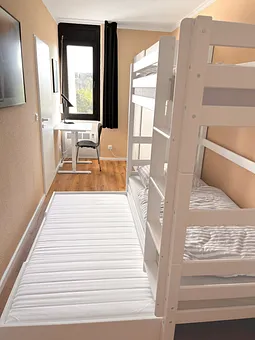 Kinderzimmer mit Doppelstock- und Ausziehbett