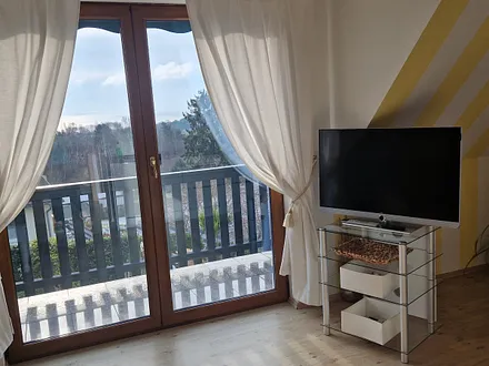 Wohnbereich mit kleinem Balkon