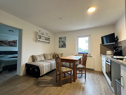 Wohnküche mit Schlafsofa 