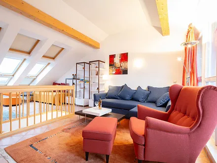 Der gemütliche Wohn- und Schlafbereich in der oberen Etage