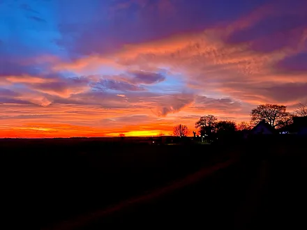 Sonnenuntergang/ Blick vom Grundstück